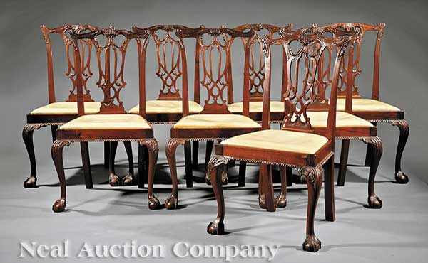 Appraisal: A Set of Eight George III-Style Carved Mahogany Dining Chairs