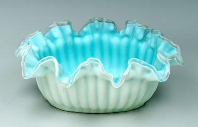 Appraisal: Mother-of-pearl satin glass bowl ruffled rim reeded white exterior with