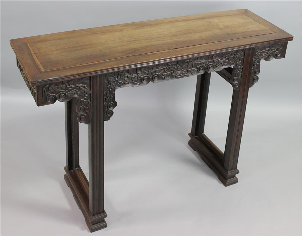 Appraisal: CHINESE HARDWOOD ALTAR TABLE QING DYNASTY the rectangular top over