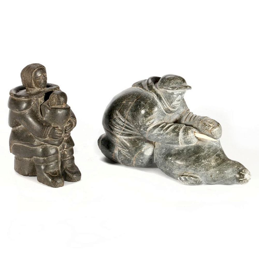 Appraisal: Two Inuit Stone Sculptures Adamie Putugu Man Skinning a Seal