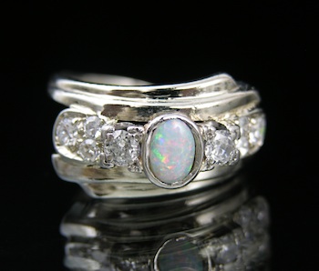 Appraisal: A Ladies' Gold Diamond and Opal Ring A k white