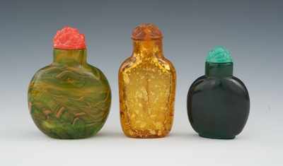 Appraisal: Three Peking Glass Snuff Bottles Chinese Containing an agate color