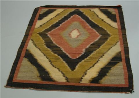 Appraisal: RED BLACK AND BROWN DIAMOND PATTERN NAVAJO RUG x INCHES