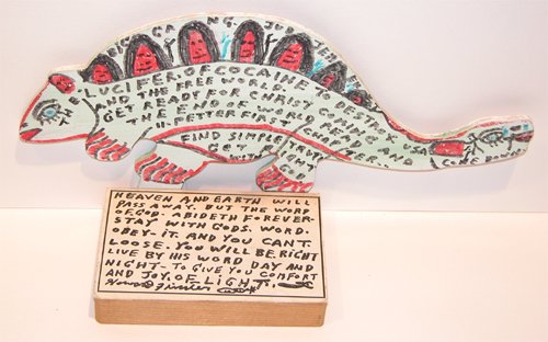 Appraisal: Howard Finster standing cutout creatures with very extensive inscriptions Artist