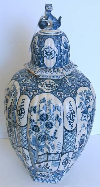 Appraisal: A Dutch Delft blue and white chinoiserie covered urn late