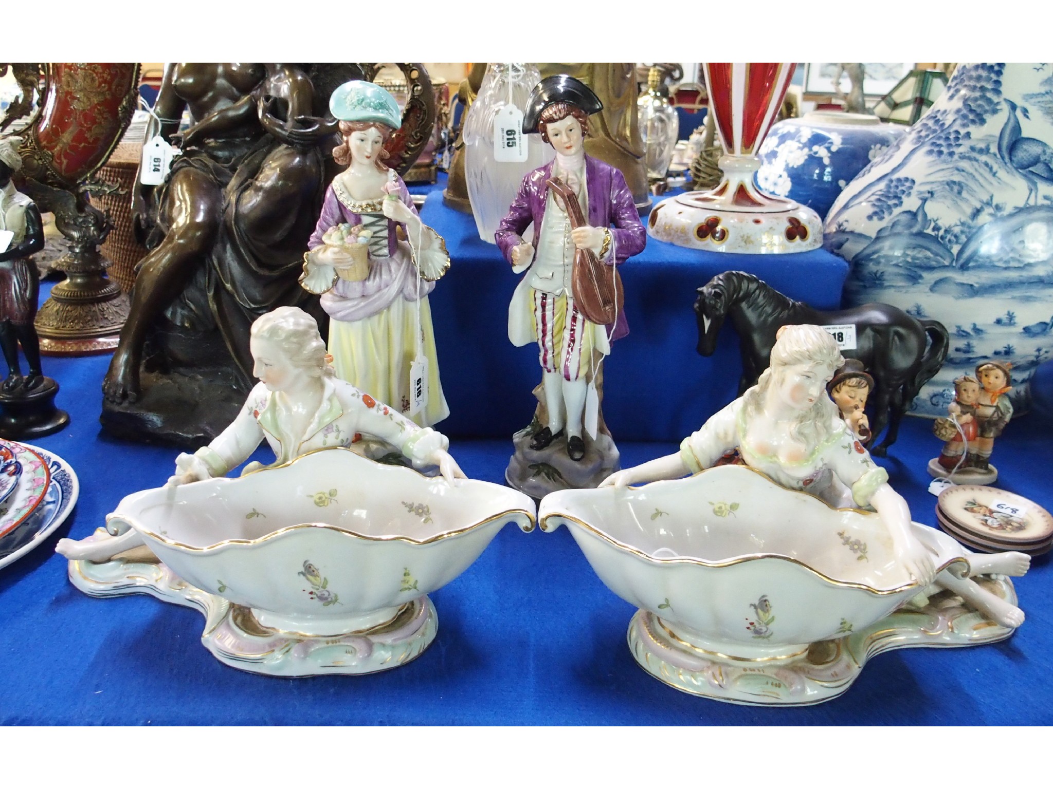 Appraisal: Pair of pottery figures and a pair of Meissen style