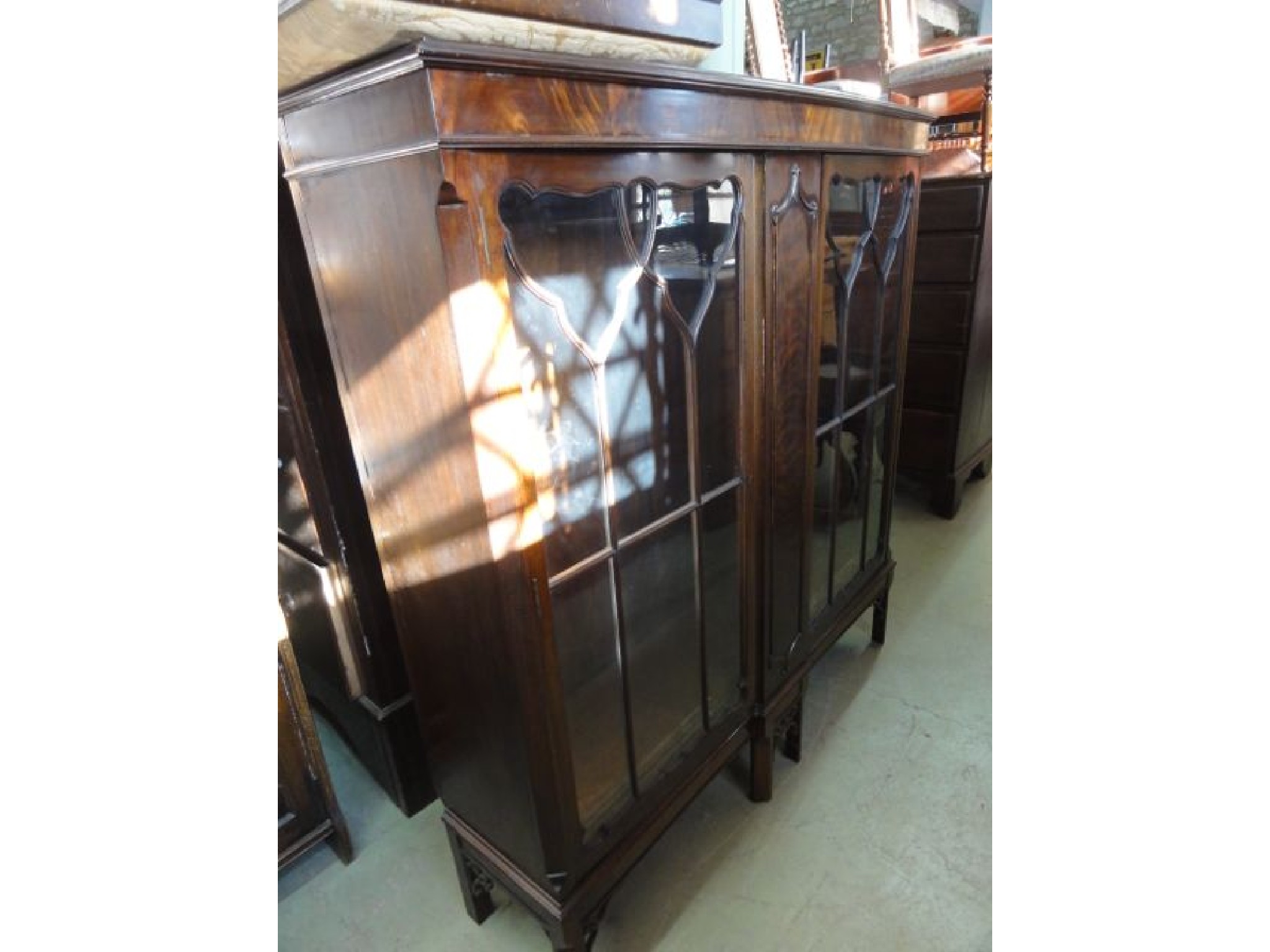 Appraisal: A good quality Edwardian mahogany bookcase side cabinet in the