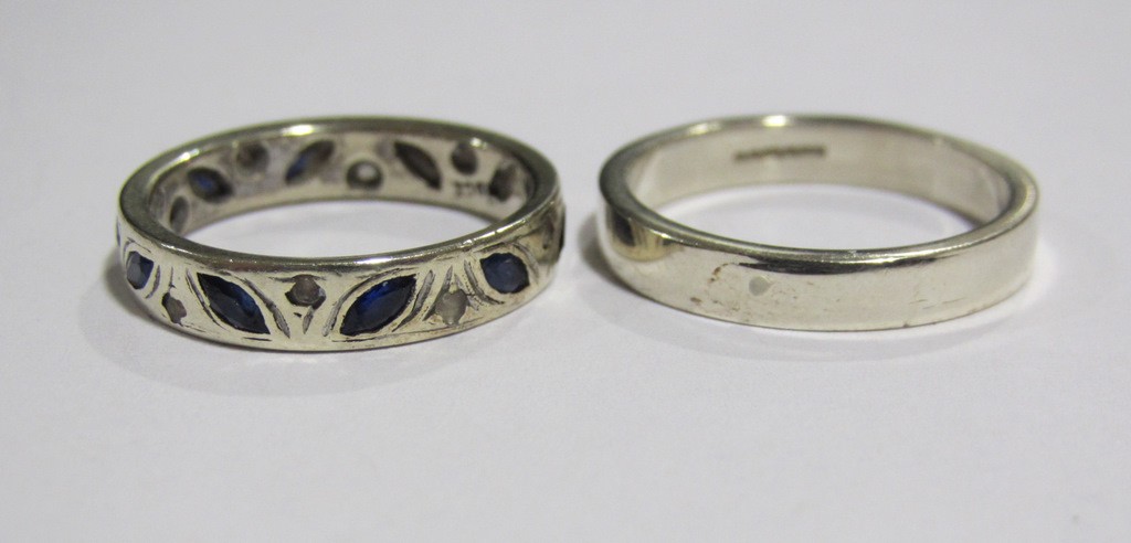 Appraisal: Two ct white gold bands one with sapphires