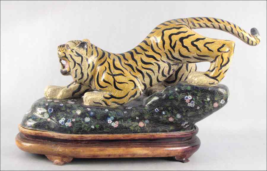 Appraisal: CHINESE CLOISONNE CROUCHING TIGER Raised on a '' base Tiger