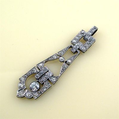 Appraisal: An Art Deco diamond set articulated white gold pendant cm