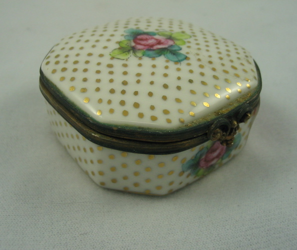 Appraisal: A LIMOGES PORCELAIN PATCH BOX hand painted gilt and rose