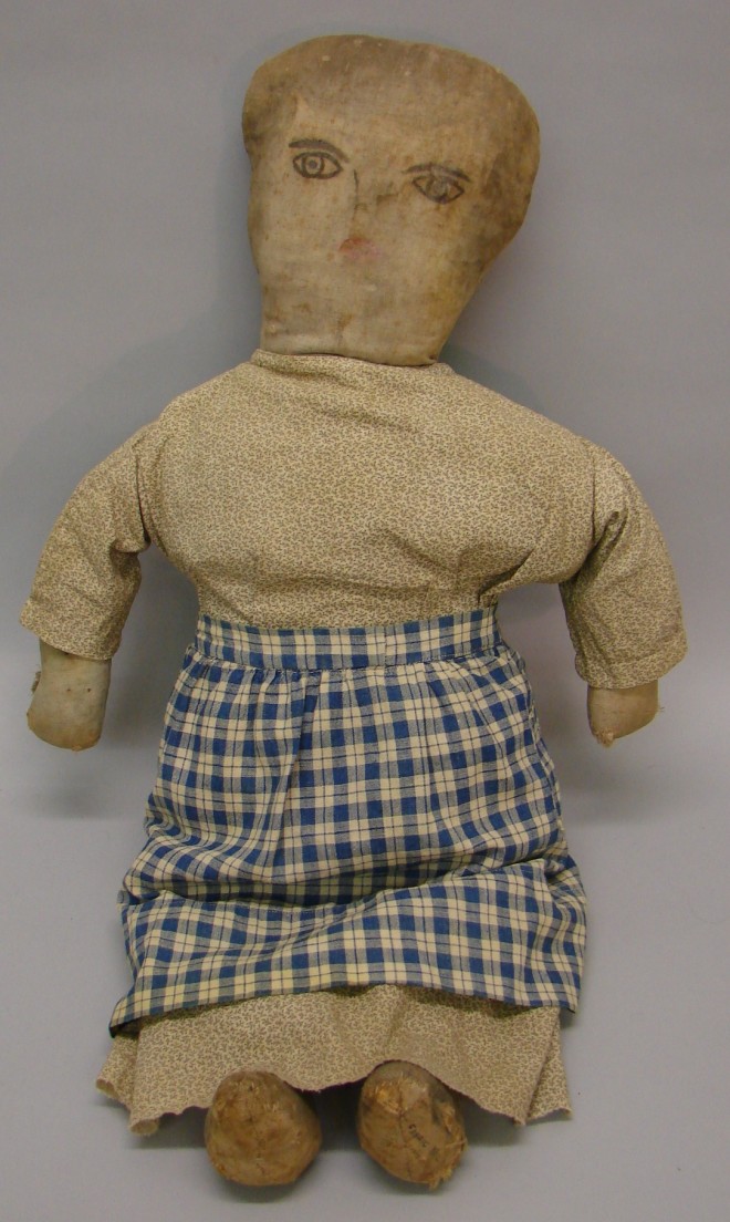 Appraisal: Folkie cloth doll Early hand painted head has been sewn