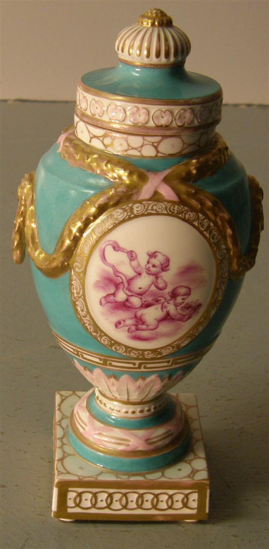 Appraisal: Berlin porcelain urn and cover th century turquoise ground moulded