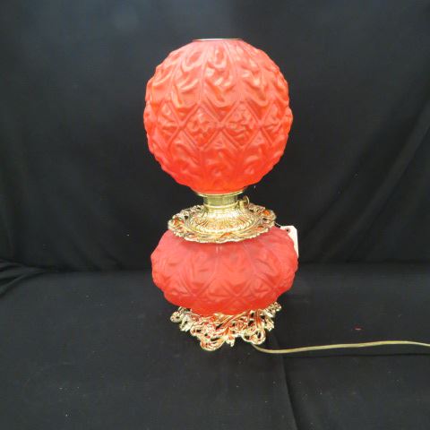 Appraisal: Consolidated Puffy Red Satin Parlor Lamp matching globe tall electrified