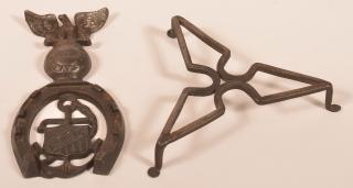 Appraisal: Two th Century Metal Trivets st Cast Iron Knights of