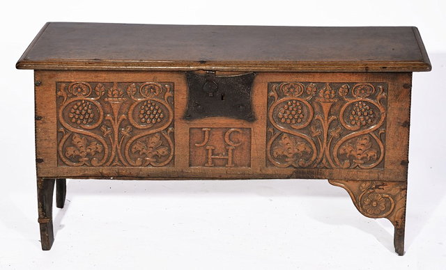 Appraisal: A TH CENTURY OAK SMALL SWORD CHEST with carved front