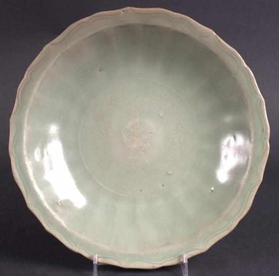 Appraisal: Chinese celadon glazed stoneware dish late early century molded lotus