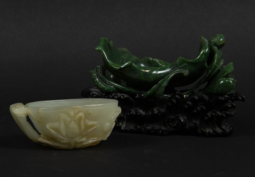 Appraisal: Two Jade Lotus-form Carvings Chinese th century One celadon jade