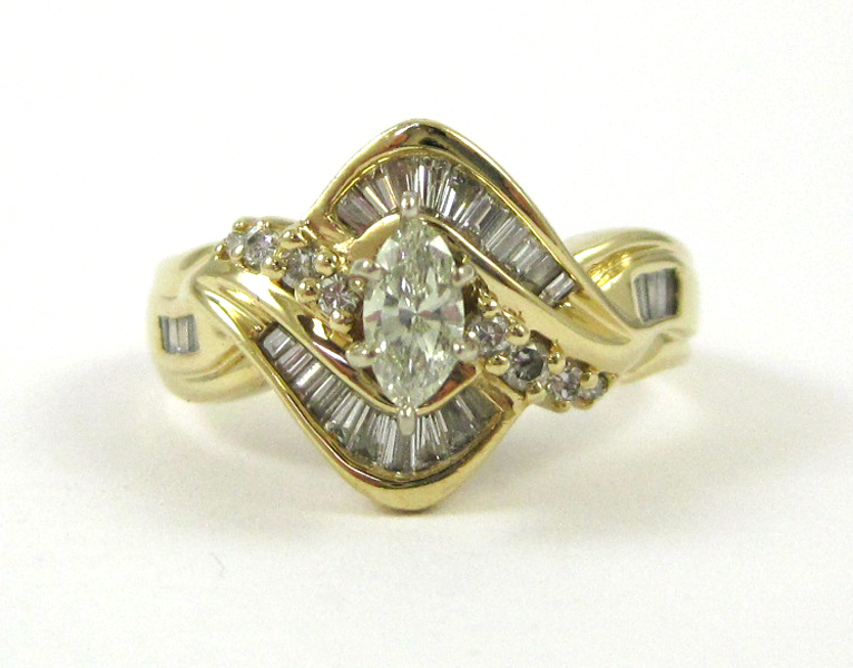 Appraisal: DIAMOND AND FOURTEEN KARAT GOLD RING with eight round-cut diamonds