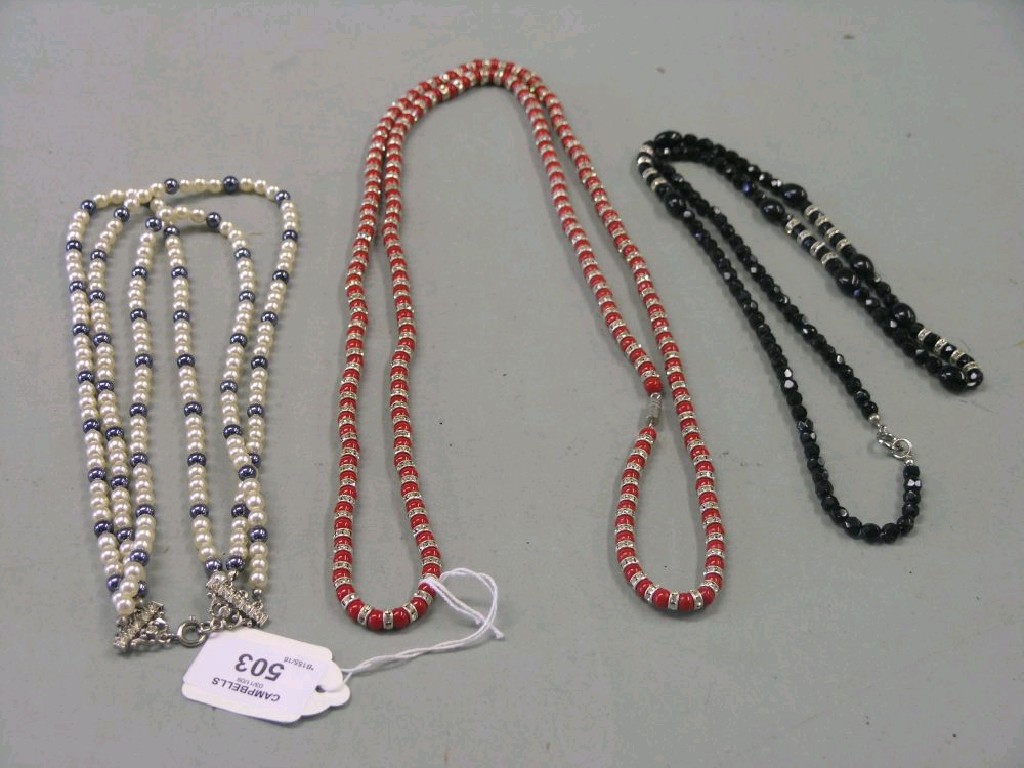 Appraisal: Three Butler Wilson bead necklaces one a red design with