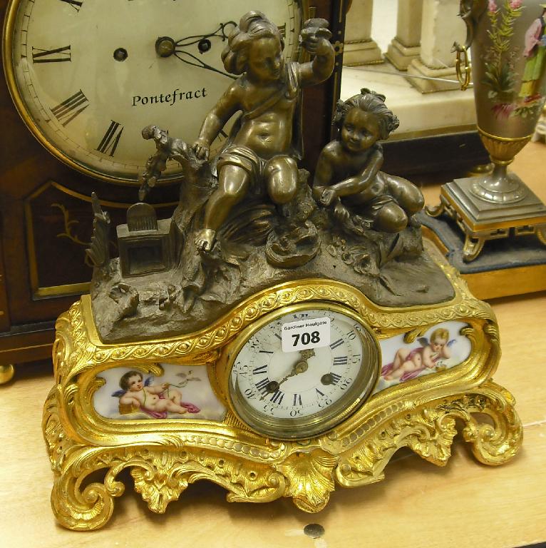 Appraisal: French ormolu bronze and porcelain two train mantel clock the