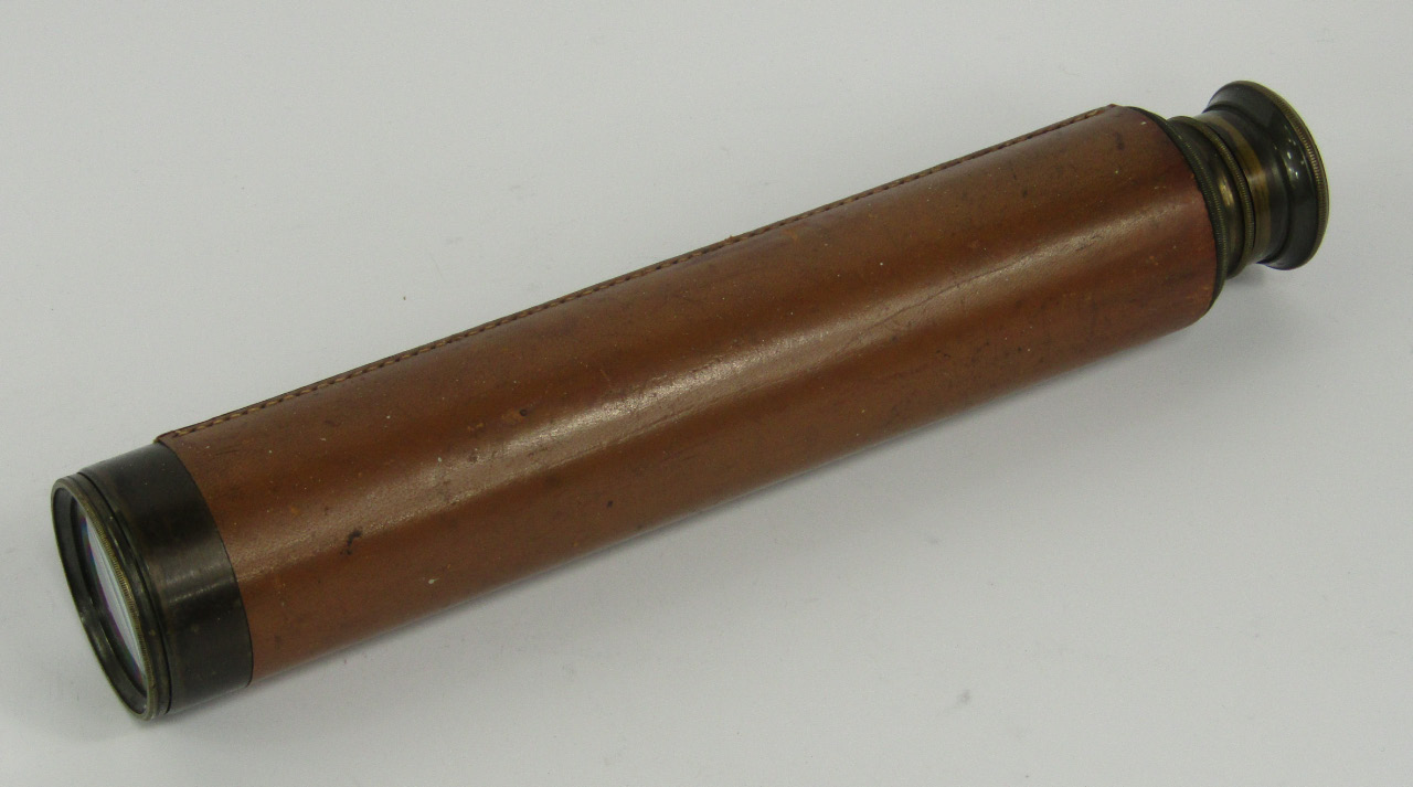 Appraisal: A brass and leather bound four drawer telescope cm long