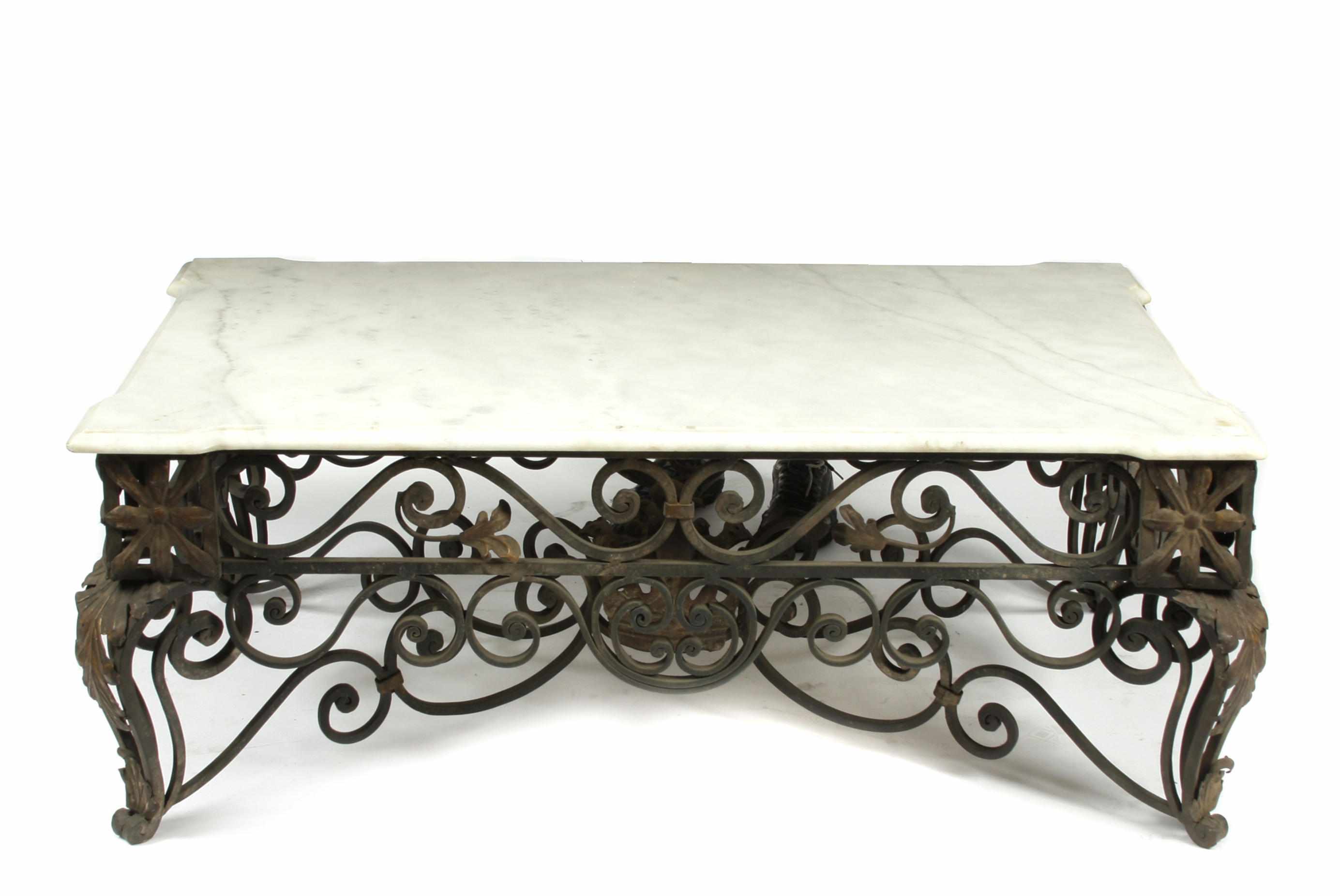 Appraisal: A Rococo style wrought iron and marble low table height