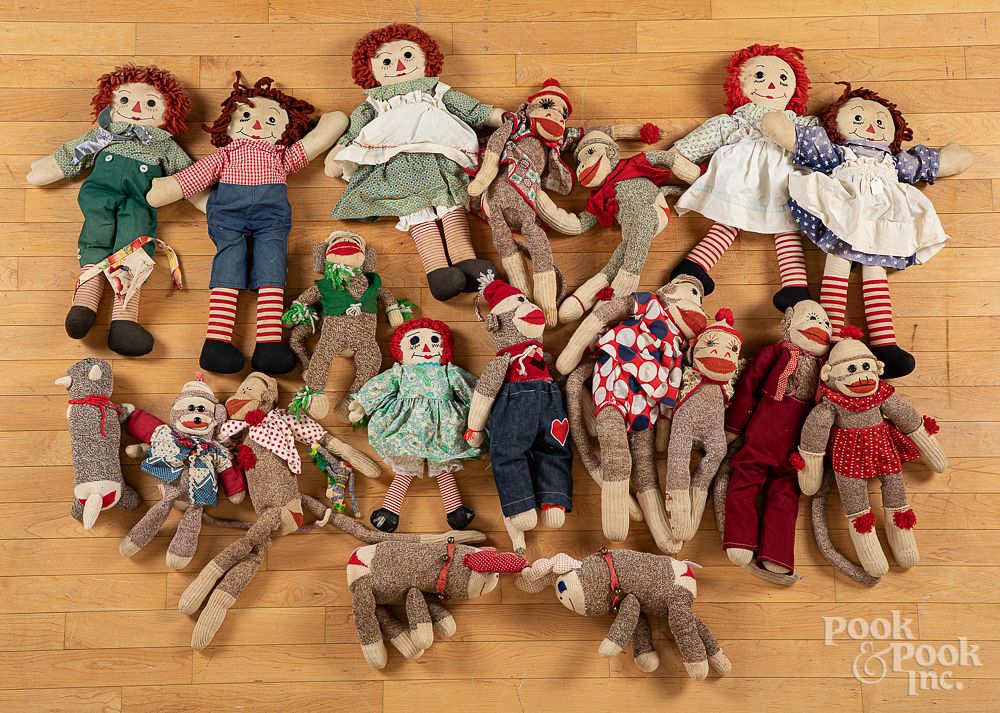 Appraisal: Group of Raggedy Anne Andy dolls and sock monkeys Group