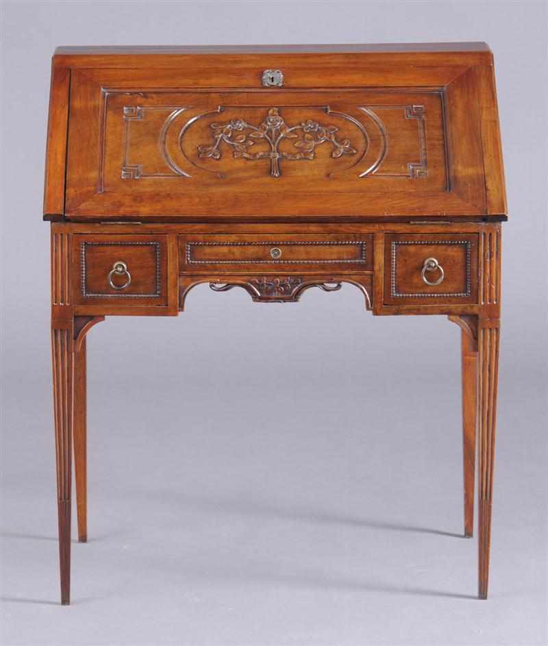 Appraisal: LOUIS XVI PROVINCIAL CARVED WALNUT BUREAU EN PENTE The flap