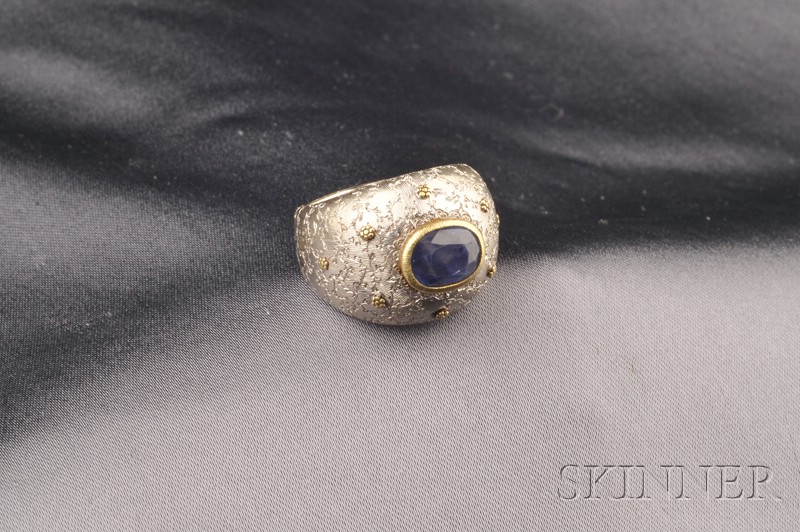 Appraisal: kt Bicolor Gold and Sapphire Ring Buccellati Italy bezel-set with