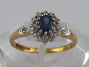 Appraisal: A carat gold sapphire and diamond ring sapphire approx x