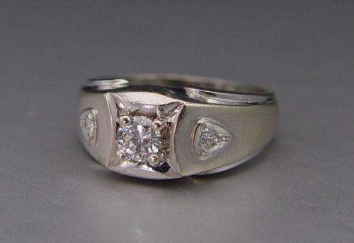 Appraisal: GENTS DIAMOND RING K white gold ring contains one round