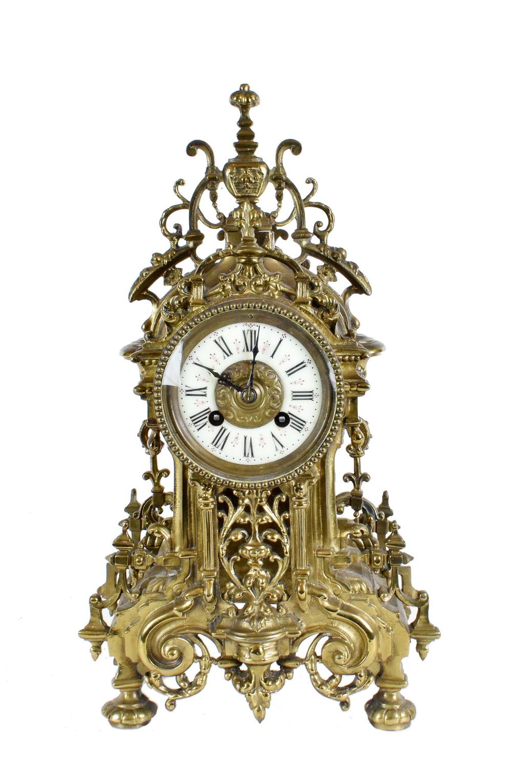 Appraisal: FRENCH BRONZE MANTLE CLOCKCirca The circular enamel dial with Roman