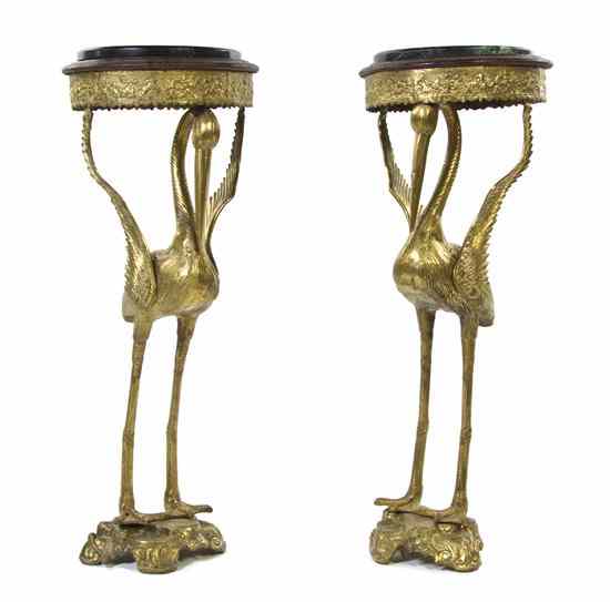 Appraisal: A Pair of Gilt Brass Figural Pedestal Tables having a