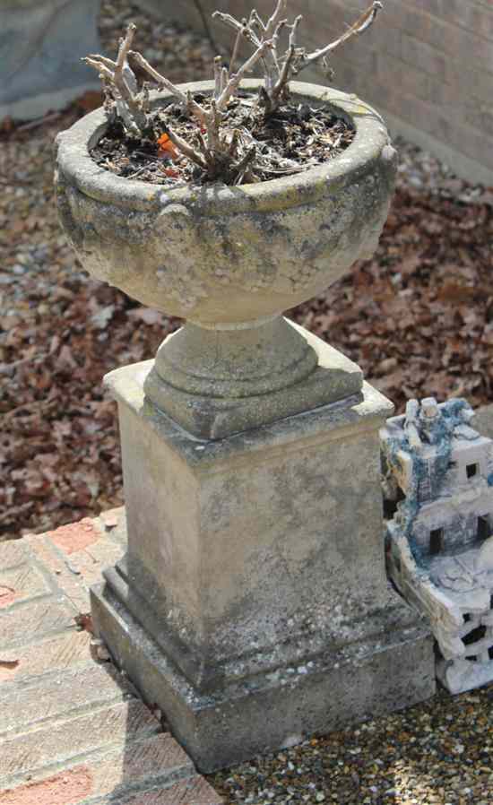 Appraisal: A small pair of composition garden urns and pedestals ft