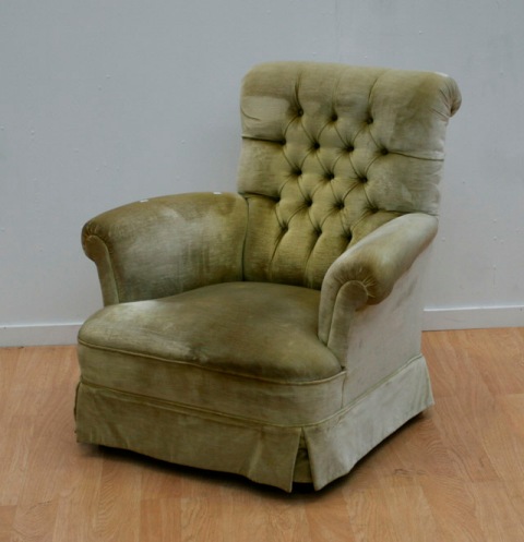 Appraisal: A green suede upholstered button down salon armchair