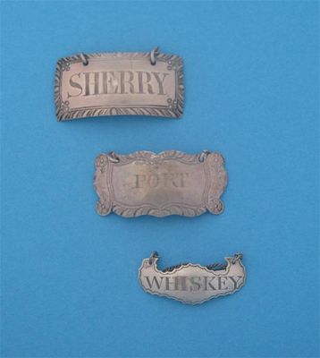 Appraisal: Three labels a George III label a feather edge incised