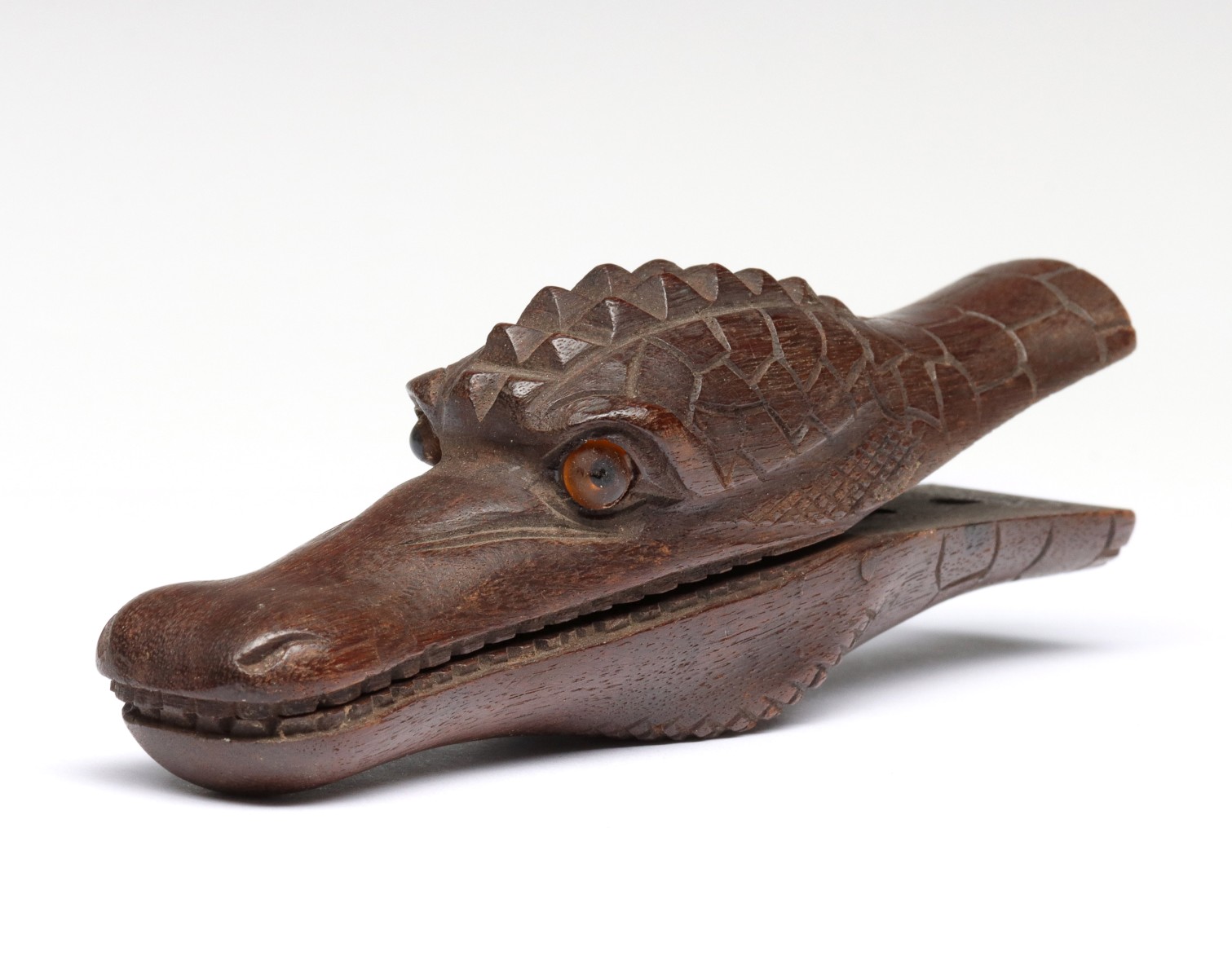 Appraisal: CARVED WALNUT ALLIGATOR LETTER CLIP CIRCA Very good condition with