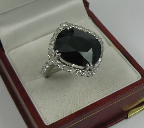 Appraisal: SAPPHIRE DIAMOND AND K WHITE GOLD RING WITH APPRAISAL centering