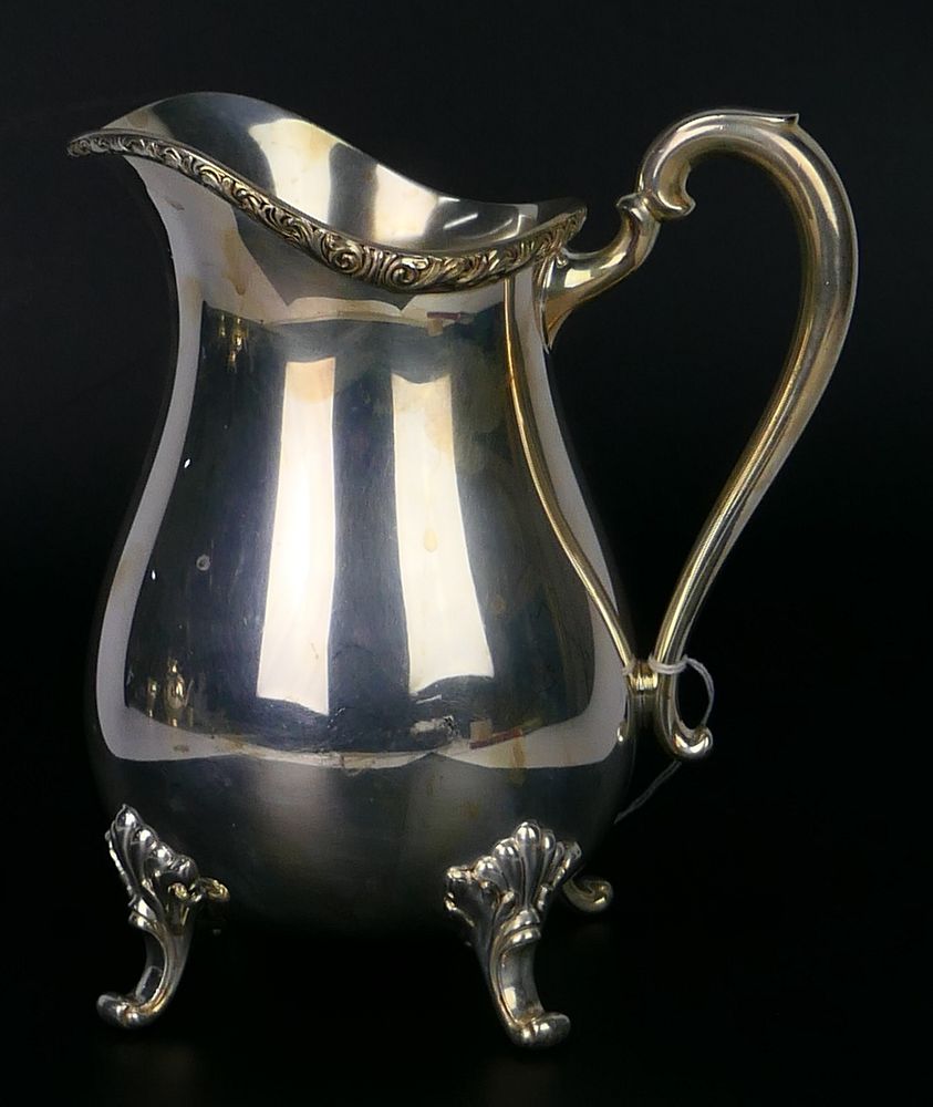 Appraisal: INTERNATIONAL SILVER WICKFORD WATER PITCHER International Silver Company silverplate Wickford