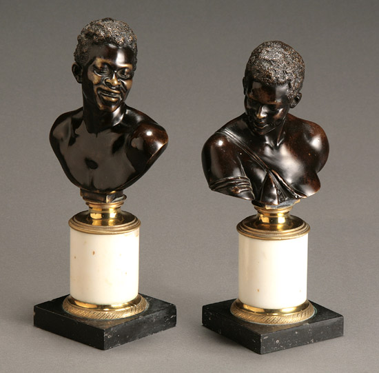 Appraisal: Pair of Continental Bronze Busts of a Nubian Man and