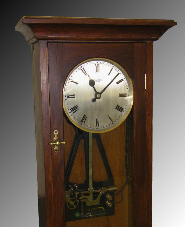 Appraisal: Good Gillett Johnson electric master clock the signed silvered circular