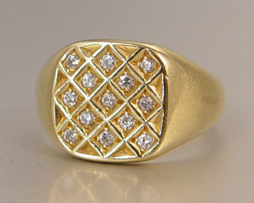 Appraisal: K DIAMOND SIGNET STYLE RING K yellow gold signet style