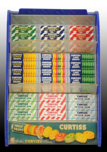 Appraisal: Plastic Metal Curtiss Candy Display Rack Description Circa s to