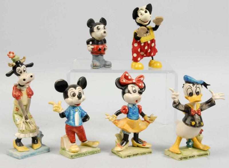 Appraisal: Lot of Disney Character Figures Description Includes one wind-up Schuco