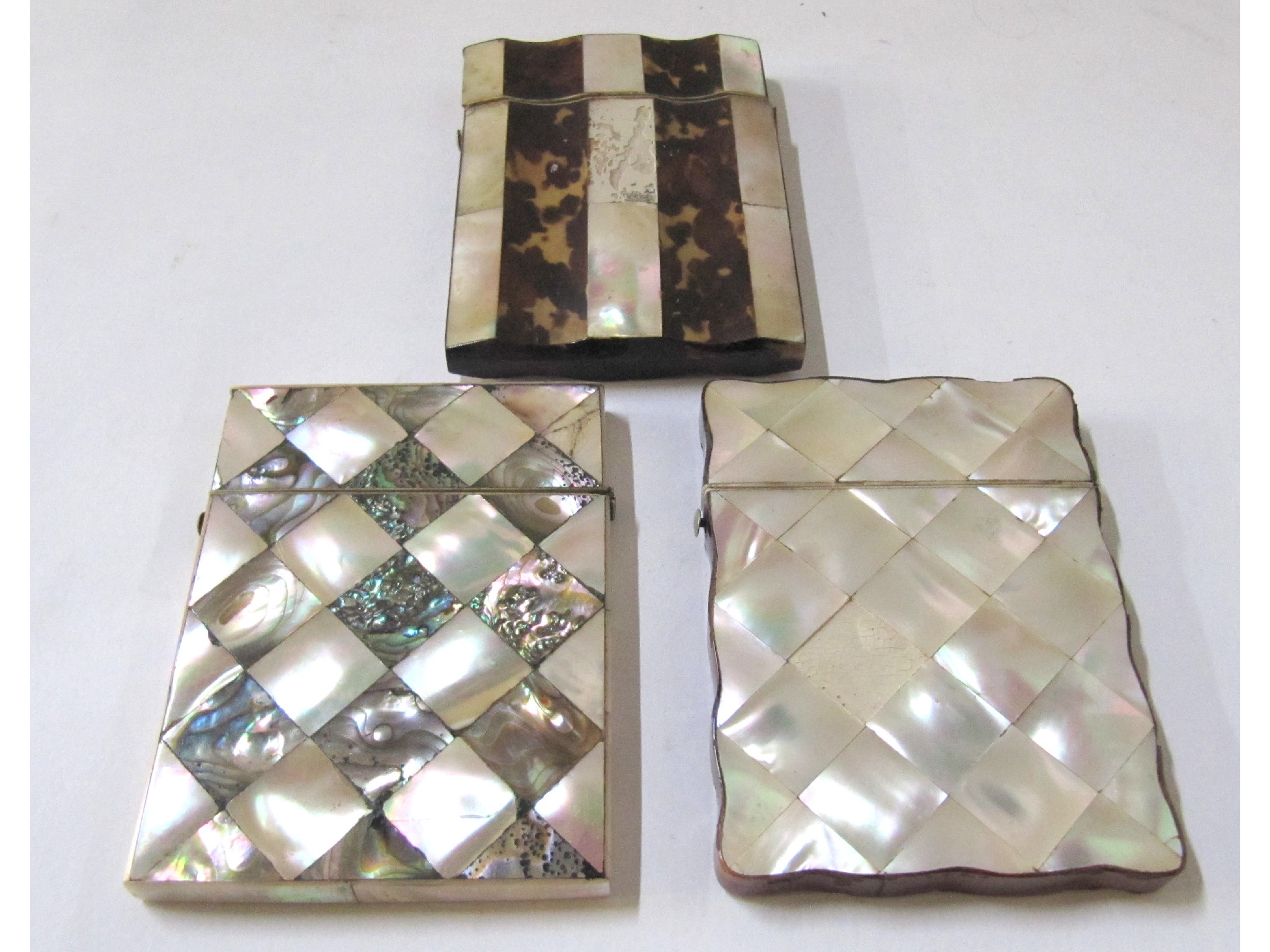 Appraisal: A lot comprising three mother of pearl card cases