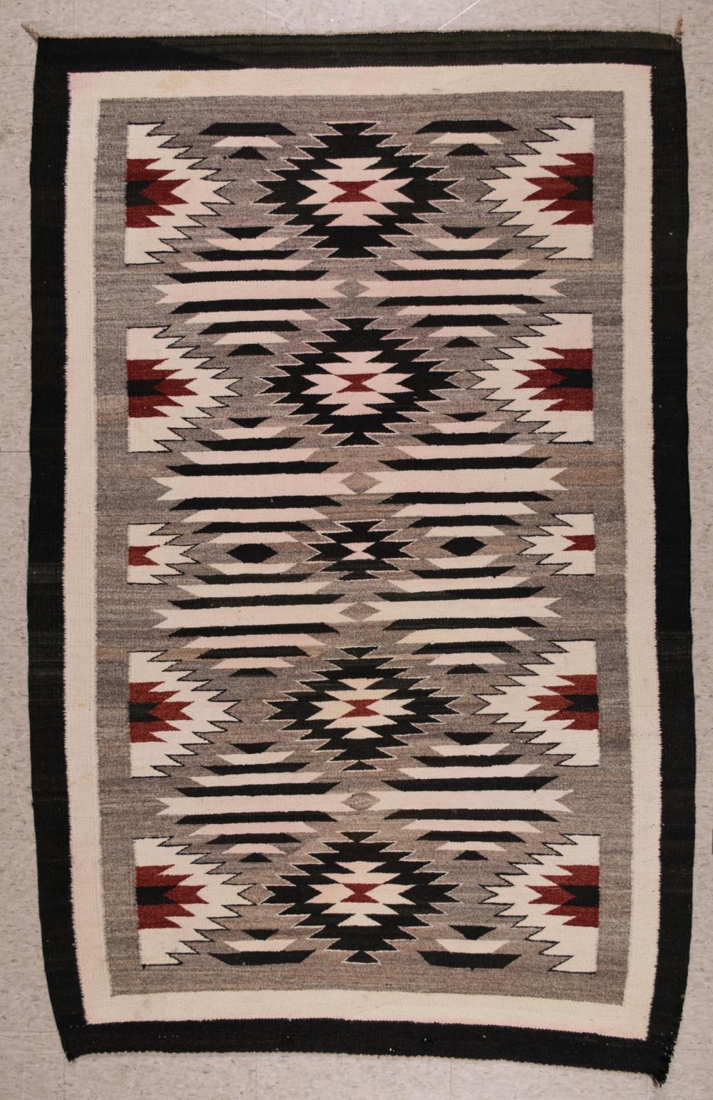 Appraisal: NAVAJO REGION WEAVING overall serrated diamond motif on grey brown