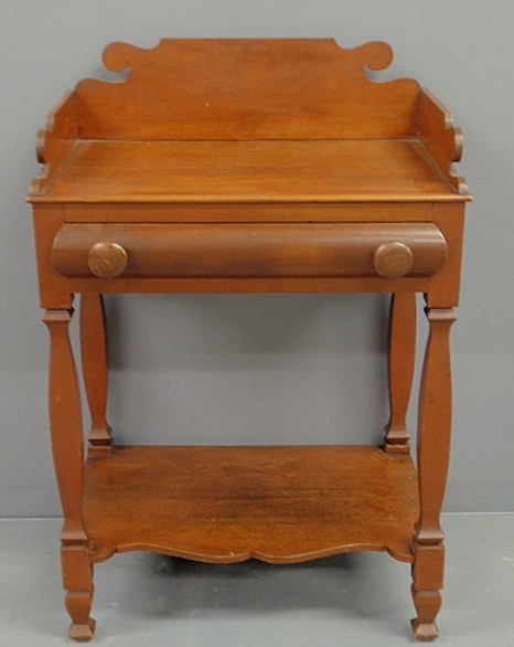 Appraisal: Sheraton cherry washstand c with a galleried top single drawer