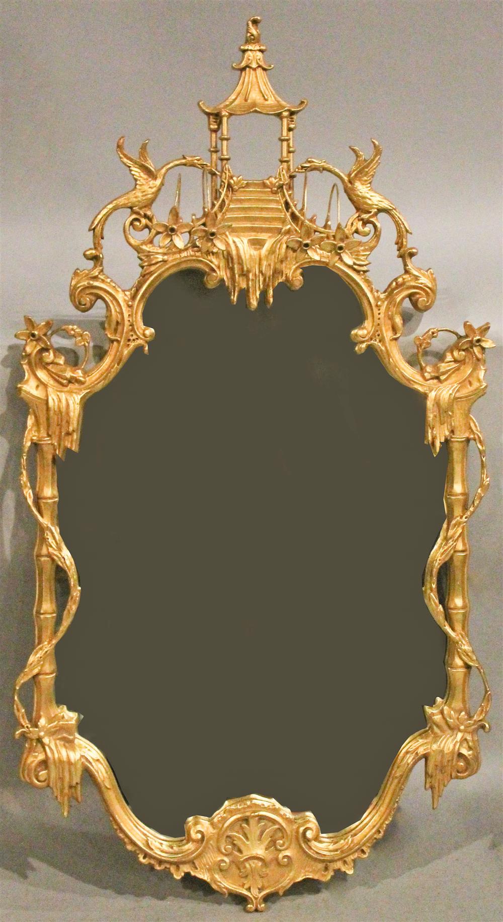 Appraisal: CHINESE CHIPPENDALE STYLE CARVED GILT MIRROR having an arching pagoda