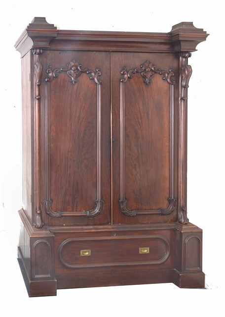 Appraisal: A WILLIAM IV MAHOGANY WARDROBE of architectural form with twin